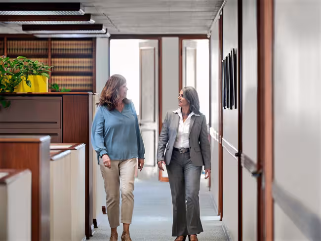 Hahn coworkers walking down hallway